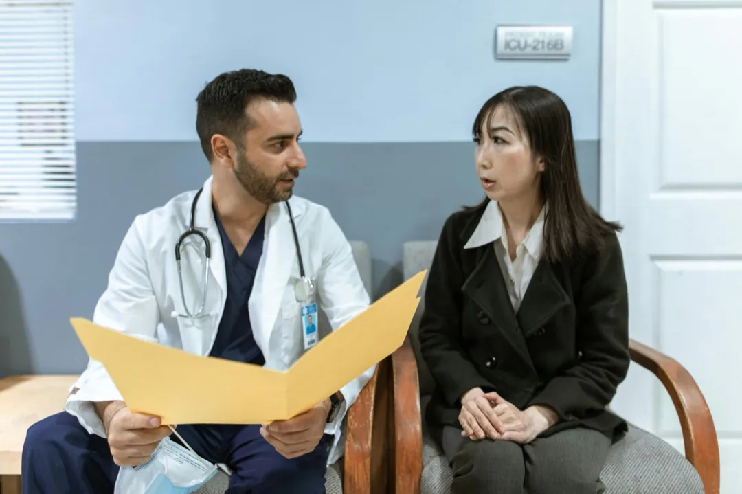 Doctor speaking with a patient during follow-up care
